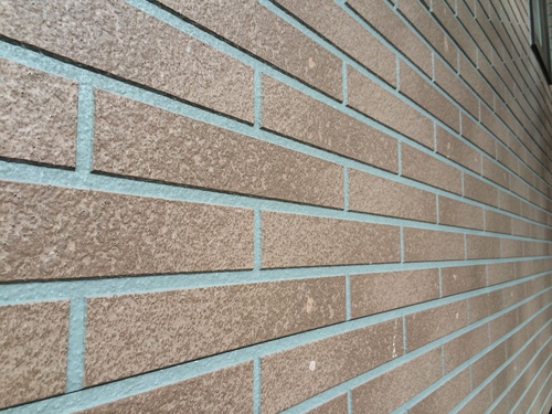 施工前の外壁 全体に色あせが見られるサイディング 江別市 外壁塗装